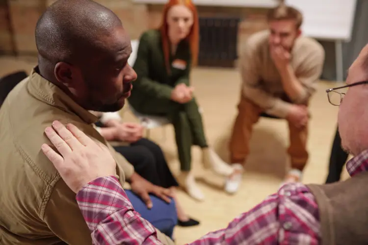 support-group-hand-on-shoulder.jpg
