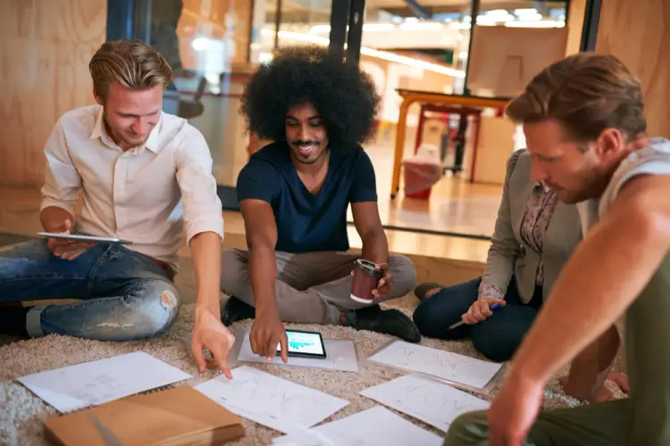 startup-team-brainstorming-on-floor.jpg