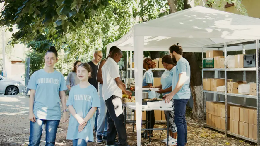 community-volunteers-serving-food-outdoors.jpg