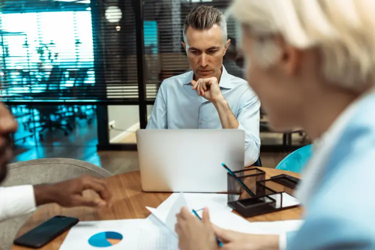 team-analyzing-financial-charts.jpg