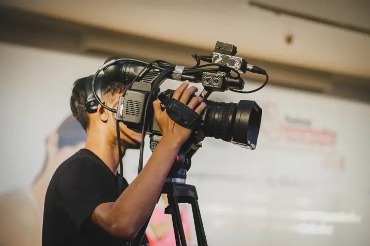 event-videographer-with-professional-camera.jpg