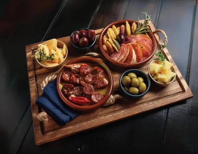 spanish-charcuterie-board-with-olives-cheese-and-salami.jpg