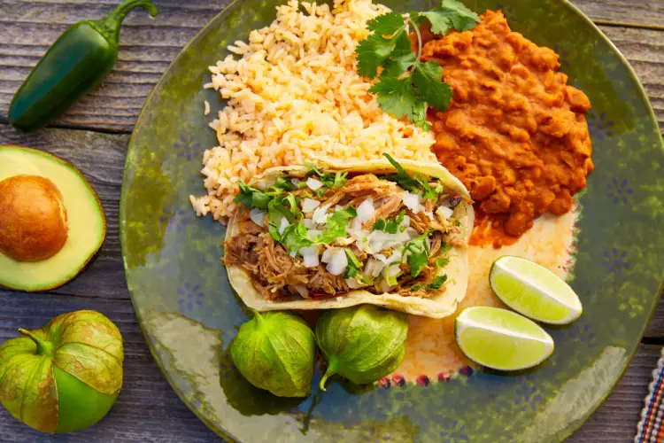 mexican-dish-with-rice-beans-and-barbacoa-taco.jpg