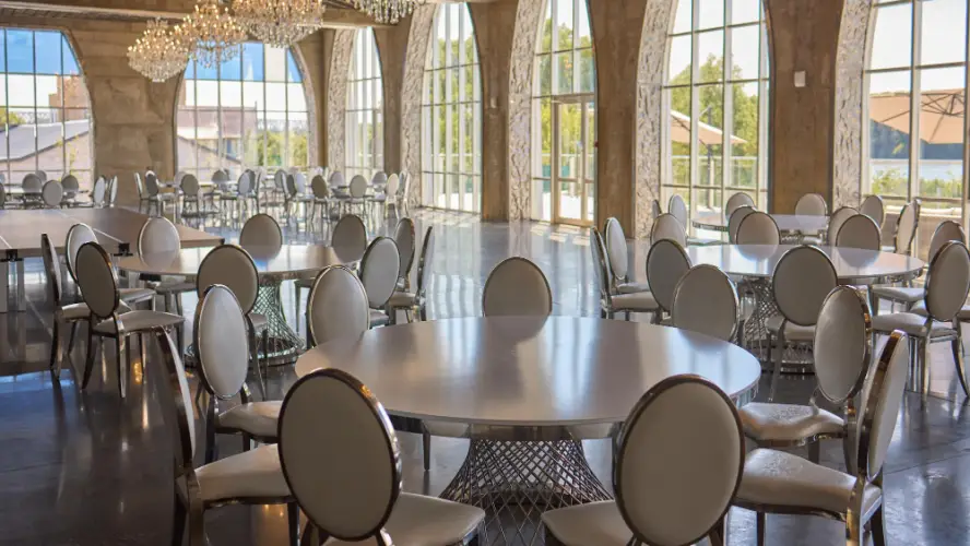 daytime-ballroom-venue-with-round-tables.jpg