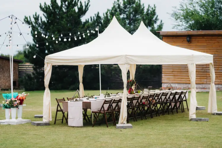 outdoor-garden-party-under-white-canopy.jpg